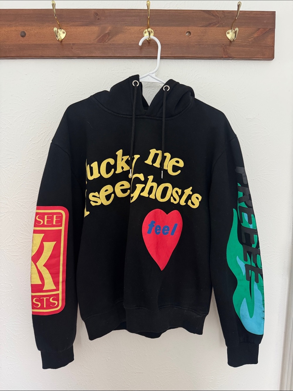 Black Graphic Hoodie with Yellow & Red Accents - Streetwear Pullover